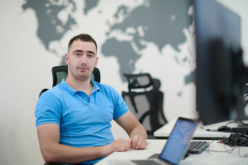 Poster - casual business man working on desktop computer