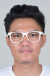 © Ranta Images - Face of handsome Asian nerd man with eyeglasses