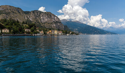 Leinwandbilder - Beautiful coastline with old town by the Maggiore lake. Italy. Wonderful view on popular historical tourist resort town Cannero Riviera on Lago Maggiore lake, Alps mountains, Italy