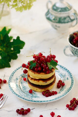 Wall Mural - pancakes with red currant..style  .selective focus
