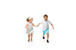 © master1305 - Happy children, little and emotional caucasian boy and girl jumping and running isolated on white background. Look happy, cheerful, sincere. Copyspace for ad. Childhood, education, happiness concept.