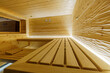 Moderne Sauna in geschroppter Zirbe mit Alttholz-Vorraum, Glasfront und kubischem Saunaofen