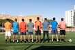 © Wavebreak Media - Multi ethnic team of male football players training at a sports field