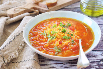 Spicy split  pea soup with tomatoes, olive oil and bread