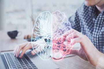 Double exposure of man hands typing on computer with credit card and brain theme drawing. E-commerce and AI concept.