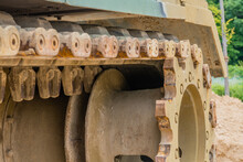 Closeup Of Tracks And Sprocket On Tank.
