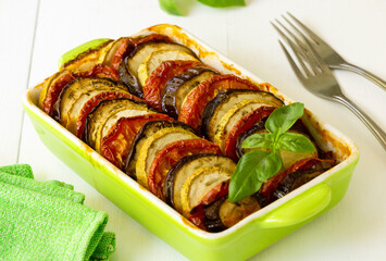 Wall Mural - Traditional french dish ratatouille. Vegetable casserole with eggplant, tomato and zucchini in a ceramic form