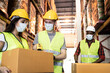 © Kawee - Group of diversity Workers wearing protective mask working in factory