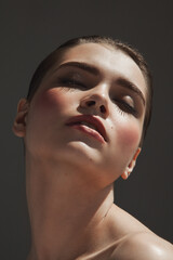 fashion beauty portrait of woman with sunlight