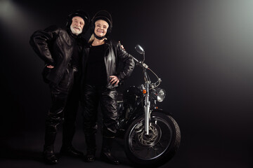 Poster - full length photo of old cool woman man biker couple hug embrace ready ride drive chopper freedom ex