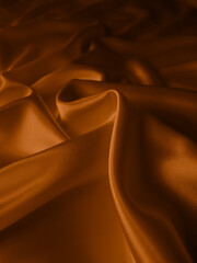 Beautiful elegant wavy brown satin silk luxury cloth fabric texture, abstract background design. Copy space.