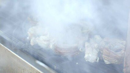 Wall Mural - Kokorec is delicious traditional a Turkish Street food. It is made of lamb intestines. 4K Footage in Turkey