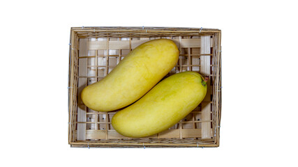 Two mango fruit in handmade bamboo basket isolated on whith background with clipping path, ,directly above shooting