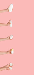 Collage of different body care products in female hands on pink background, empty space