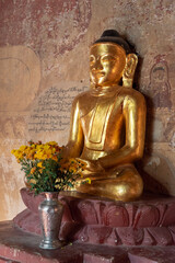 Wall Mural - Golden sitting  Buddha  statue in Sulamani temple in Bagan, Burma Myanmar