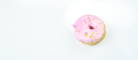 Donut mini with colorful sprinkles isolated on white background. Top view.