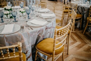 Canvas Print - Closeup shot of a beautifully decorated table in a hall for a luxurious event