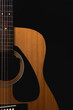 © SUKON - Close up detail of orange acoustic guitar