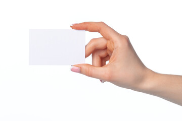 Poster - Female hand with blank white business card isolated on white