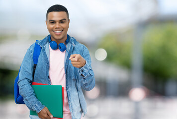 Wall Mural - Handsome brazilian male student with braces