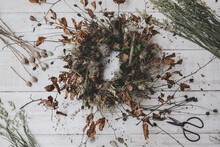 A Wreath Made From Twigs And Dried Leaves, Teasels And Seedheads,