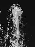 Fototapeta Młodzieżowe - abstract splash of a jet of water on a black background