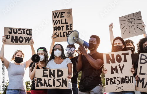 Plakat Activist movement protesting against racism and fighting for equality - Demonstrators from different cultures and race protest on street for equal rights - Black lives matter protests city concept