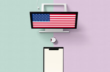 United States National Flag On Computer Screen Top View, Cupcake And Empty Note Paper For Planning. Minimal Concept With Turquoise And Purple Background.