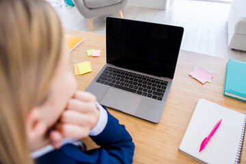 Canvas Print - Back rear behind cropped photo of little school girl chatting classmates laptop notebook video call listen teacher attentively lesson online sit table study distance quarantine indoors