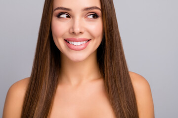 Wall Mural - Cropped close-up portrait of her she nice-looking attractive lovely charming fascinating cheerful cheery straight-haired girl looking aside serum therapy isolated over gray pastel color background