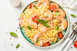 © nadianb - Pasta seafood with shrimp on white table.