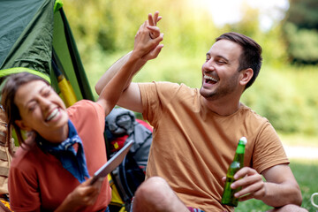 Sticker - Couple camping in the forest.