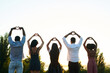 © etonastenka - Black people are showing a heart. Black people are having fun together