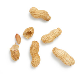 heap of peanuts in shell and broken, food isolated on white background, close up