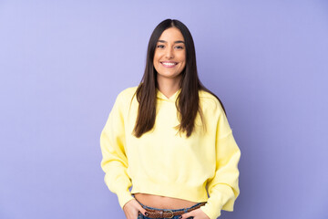 Young caucasian woman over isolated background laughing