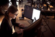 © Tasty Content  - Girl with glasses in business clothes. Works on the computer.