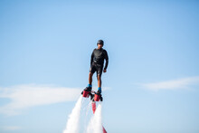 Silhouette Of A Fly Board Rider At Sea