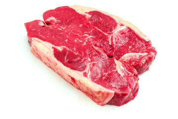 Two fresh strip loin steaks on a white isolated background. Meat industry product.