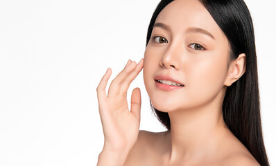 beautiful young asian woman with clean fresh skin, on white background, face care, facial treatment,