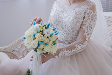 Poster - bride sitting in studio with wedding bouquet