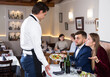 © JackF - Dissatisfied young couple talking to apologetic waiter, dissatisfaction with food