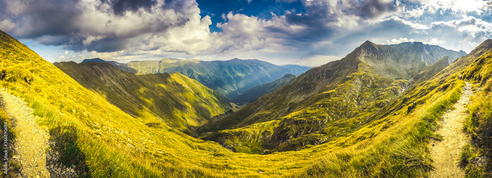 Mountain landscape. Hiking fagaras mountains in Romania. Carpathians, Transilvania, Romania, Europe. Transfagarasan road. Panorama - obrazy, fototapety, plakaty 