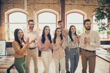 Wall Mural - Photo of excited business men ladies people corporate friendly atmosphere spacious office diversity members successful meeting partners ovation colleague birthday professionals indoors