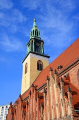 Poster - Vertical shot of St. Mary's Church in Berlin, Germany on a sunny day