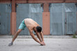 © Vladimir - Man does a warm-up before training on the street. Workout, training, lifestyle