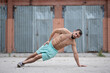 © Vladimir - Man does a warm-up before training on the street. Workout, training, lifestyle