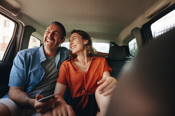 Loving couple going out in a taxi