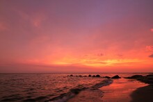 Scenic Seascape Scenery With Intense Red-purple Sky