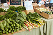 © Jen Lobo - Display of zucchini, frisee and Swiss chard for sale at a Farmers Market in Boulder, Colorado