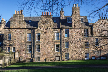 Wall Mural - Old tenement houses around Greyfriars cemetery in the Old Town of Edinburgh city, Scotland, UK